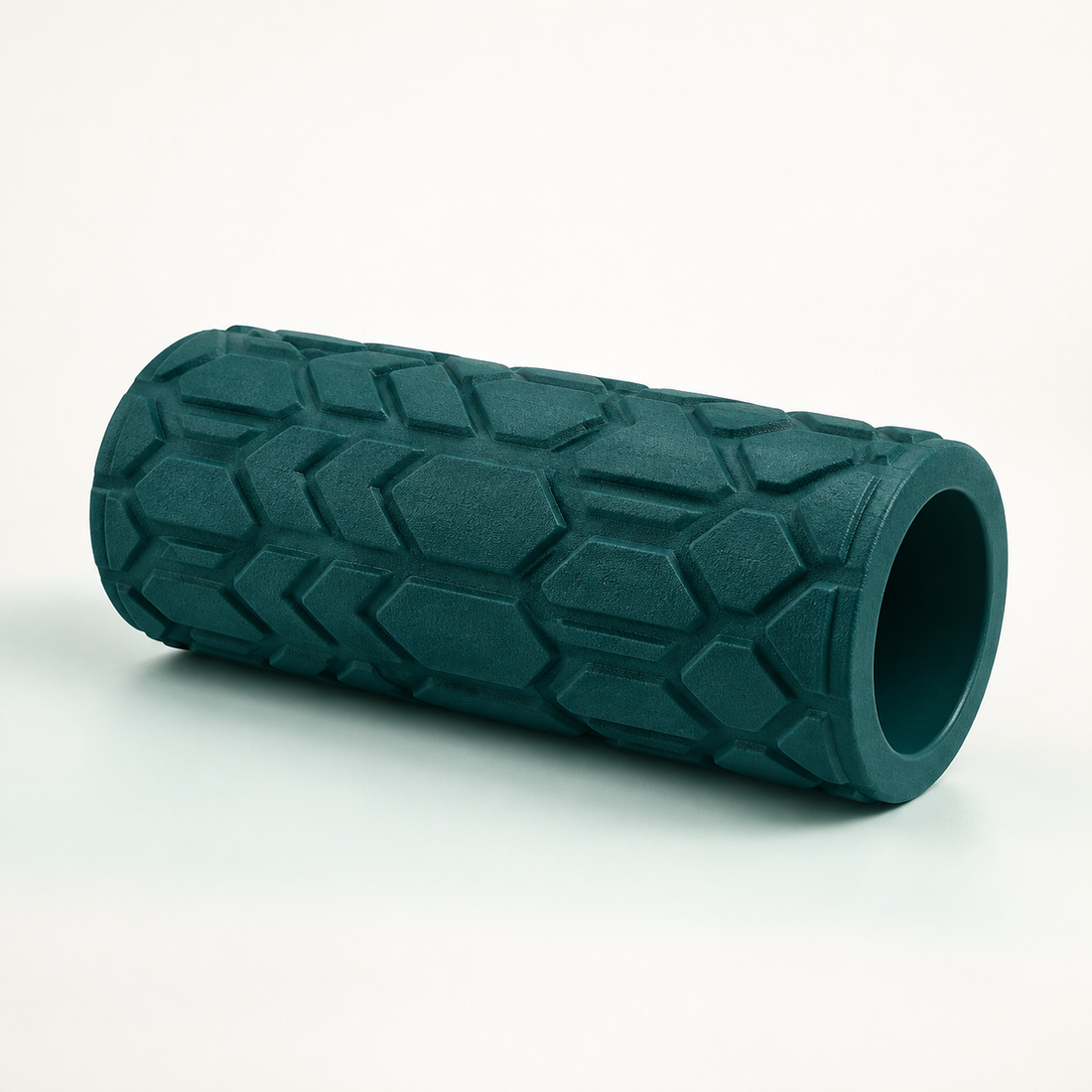 Textured foam roller on a calm neutral background