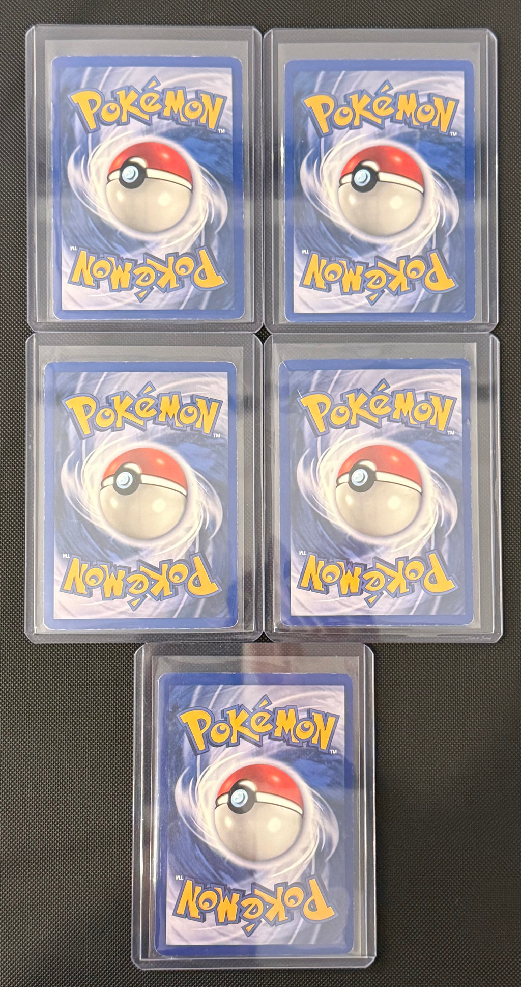 Actual english Pokémon cards — Nidoqueen 7/64, Mr. Mime 6/64, Vileplume 15/64, Vaporeon 12/64, Kangaskhan 5/64 — bundle photograph