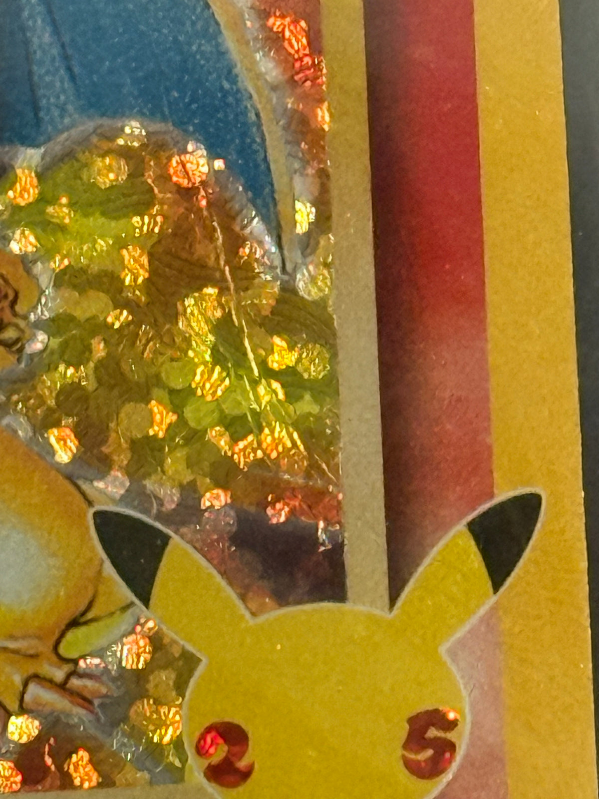 Actual English Celebrations Charizard 4/102 — 25th anniversary card