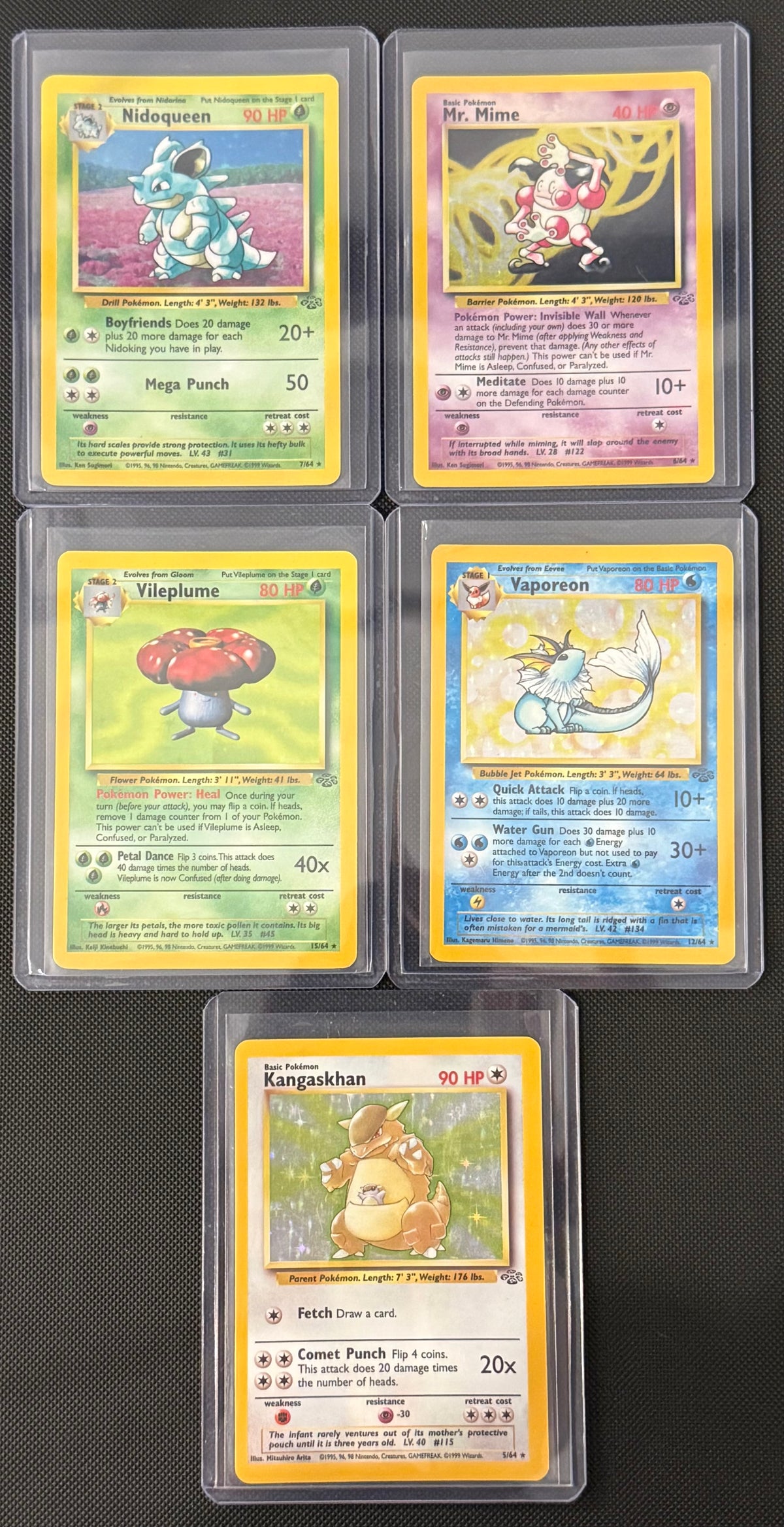 Actual english Pokémon cards — Nidoqueen 7/64, Mr. Mime 6/64, Vileplume 15/64, Vaporeon 12/64, Kangaskhan 5/64 — bundle photograph