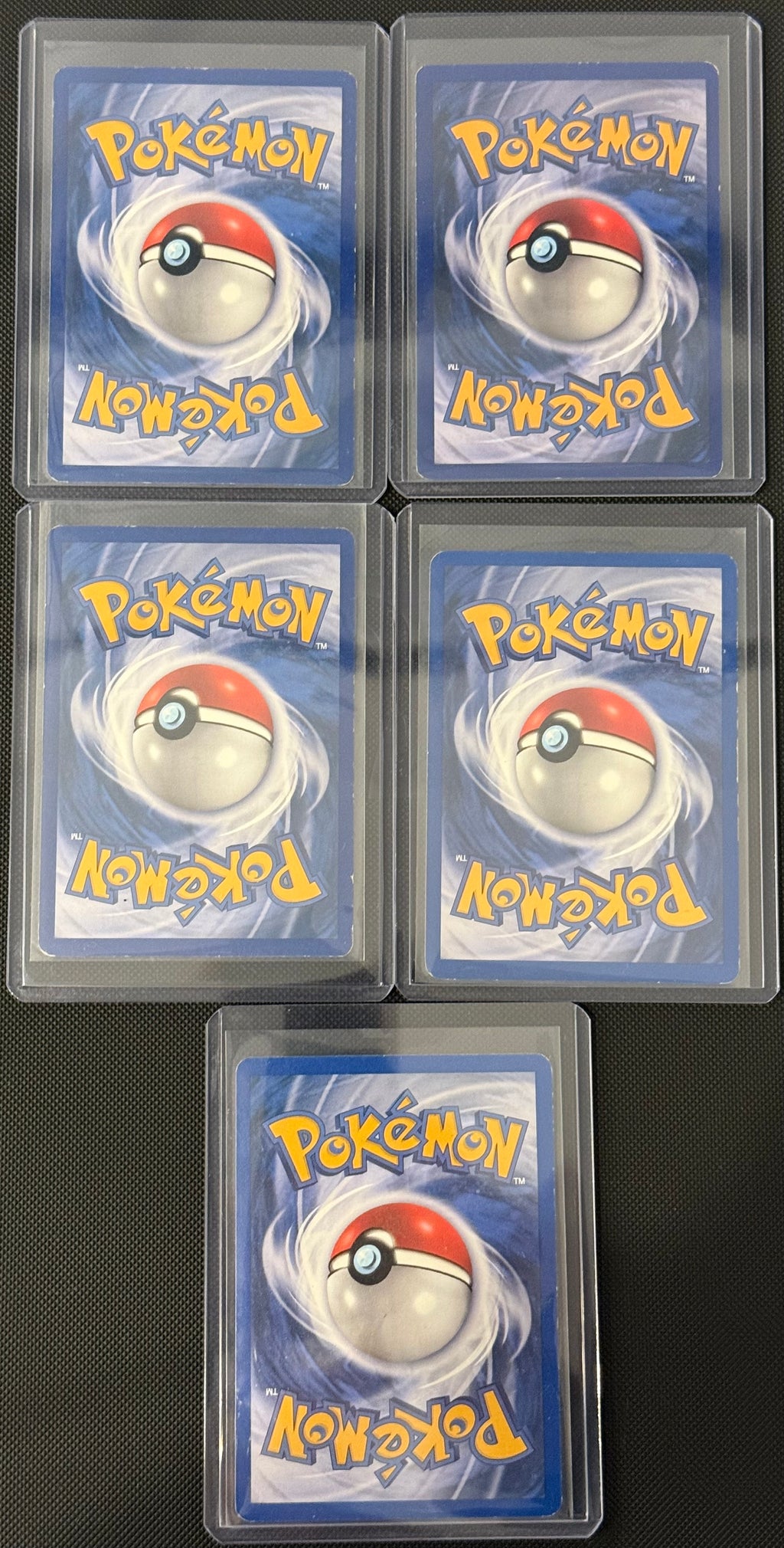 Actual english Pokémon cards — Pikachu 60/64, Eevee 51/64, Meowth 56/64, Mankey 55/64, Jigglypuff 54/64 — bundle photograph