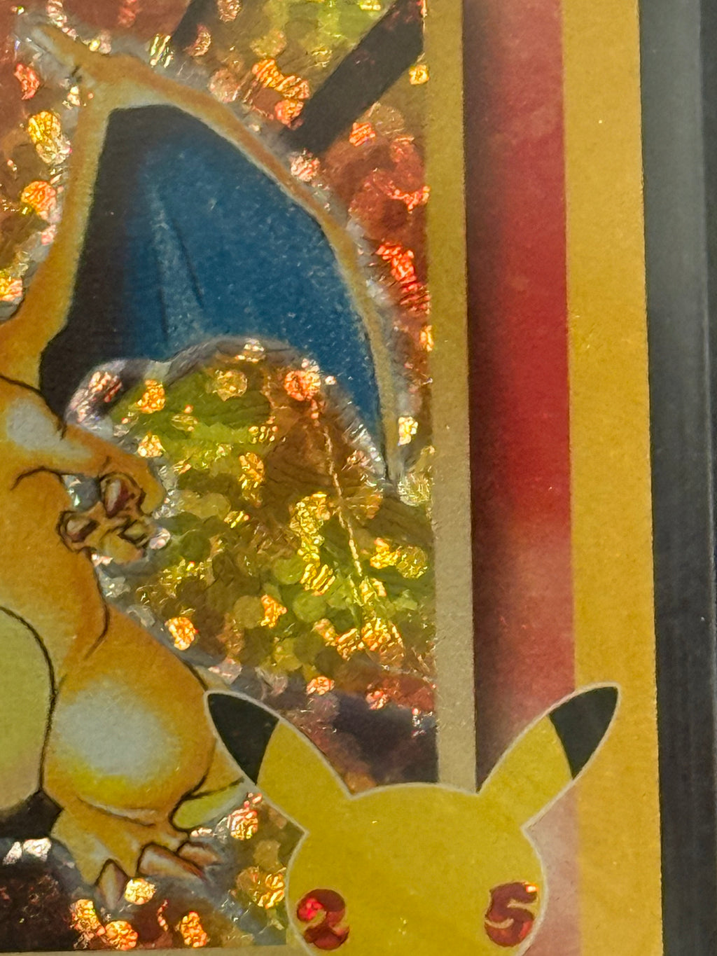 Actual English Celebrations Charizard 4/102 — 25th anniversary card