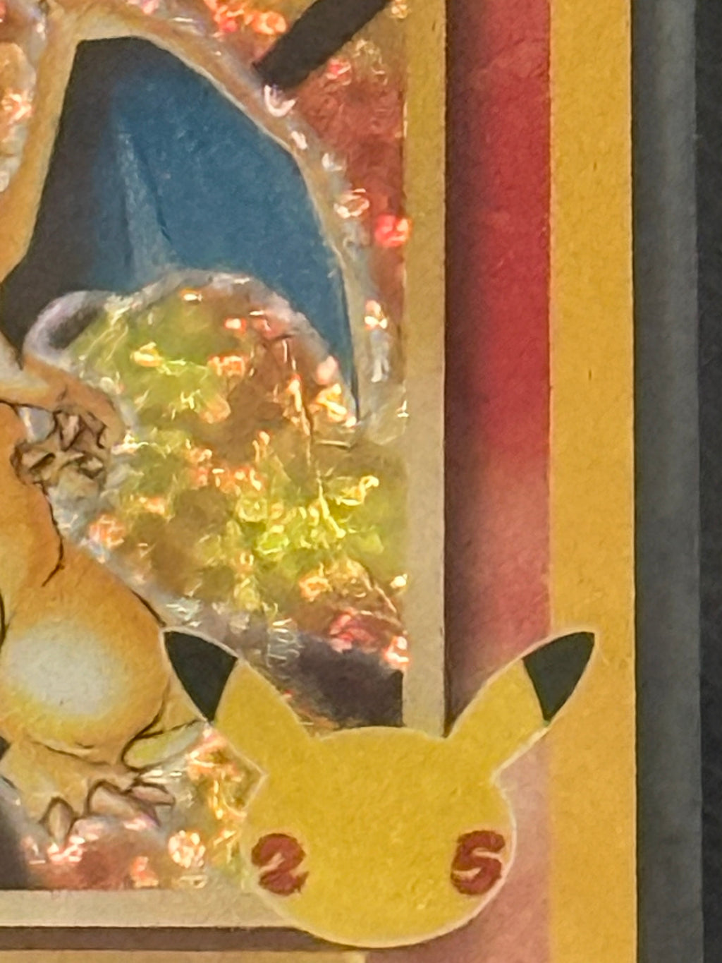 Actual English Celebrations Charizard 4/102 — 25th anniversary card