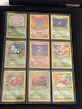 Nine additional English Jungle cards in a binder page — actual cards included