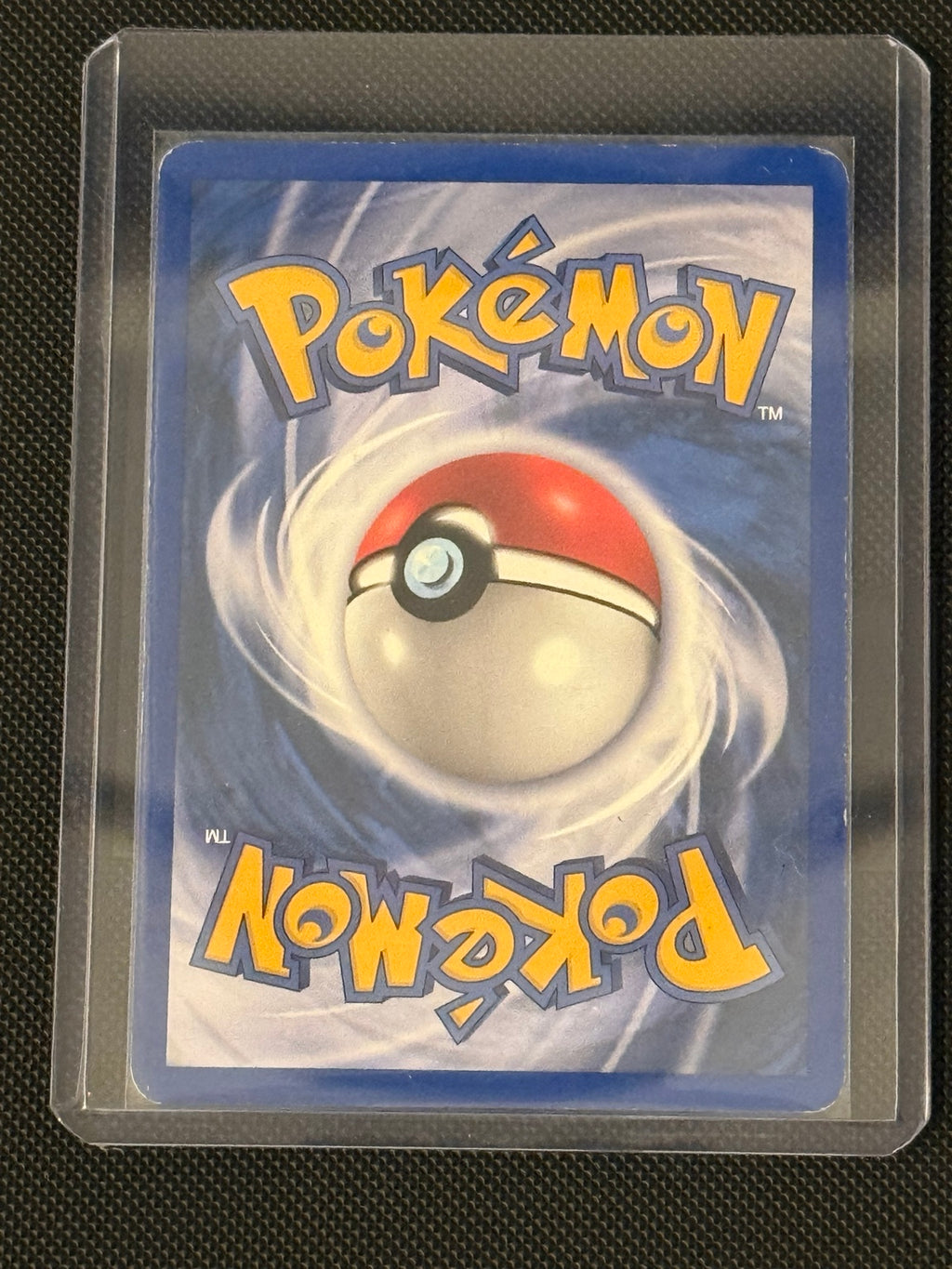 Sneasel 25/111 · Neo Genesis · 1st Edition actual card back