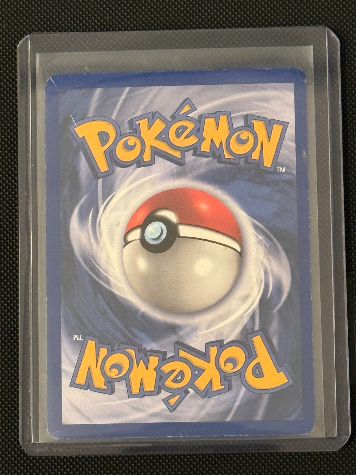 Vaporeon 12/64 Jungle Unlimited holo Pokémon card (English) — actual card back